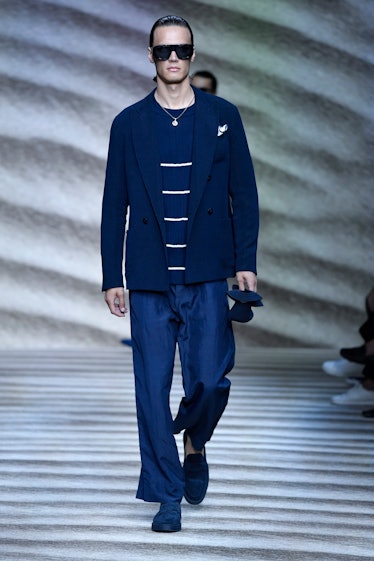 MILAN, ITALY - JUNE 20: A model walks the runway during the Giorgio Armani Ready to Wear Spring/Summ...